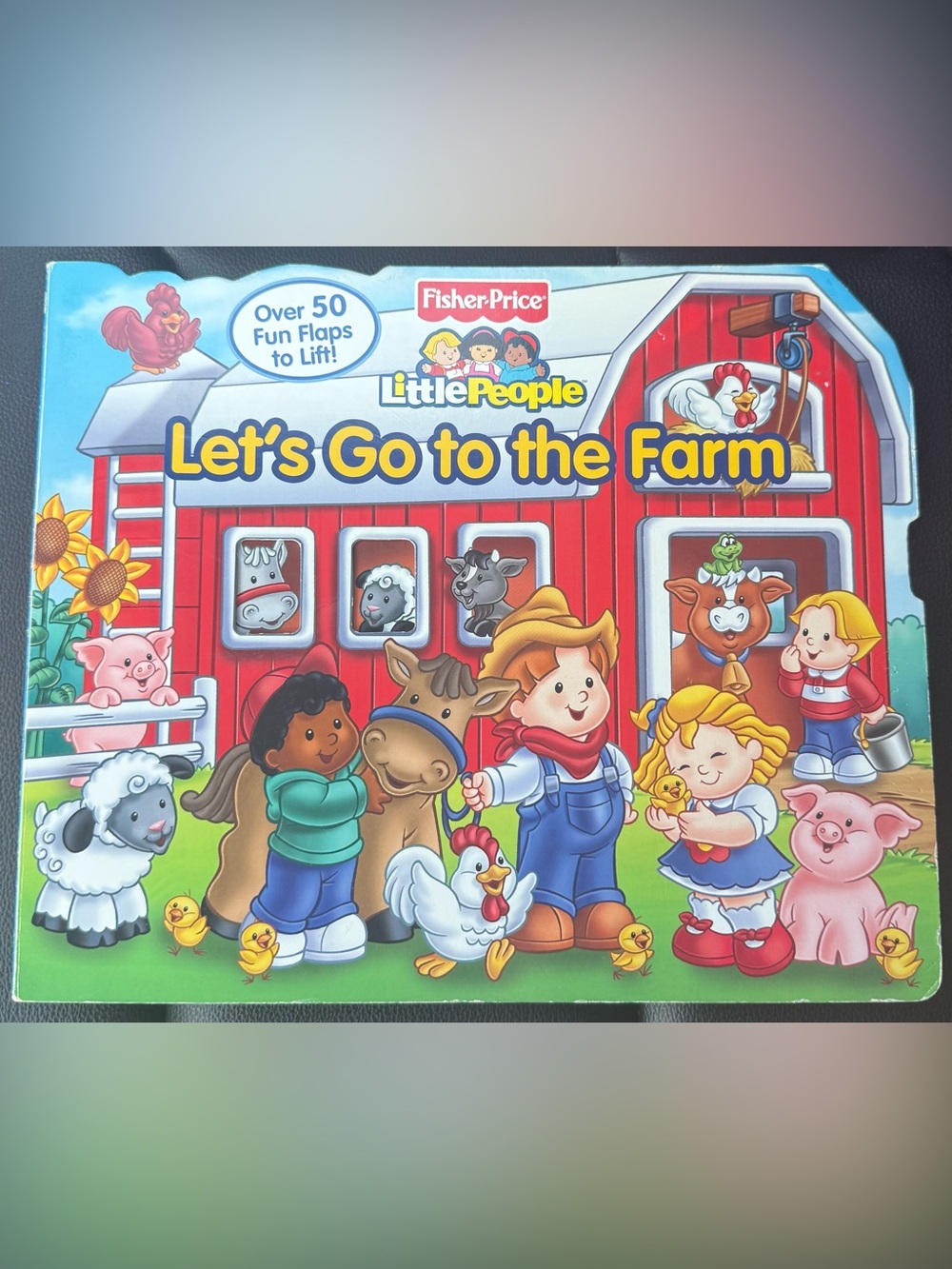 Fisher-Price Little People Let’s Go to the Farm Lift-the-Flap Book